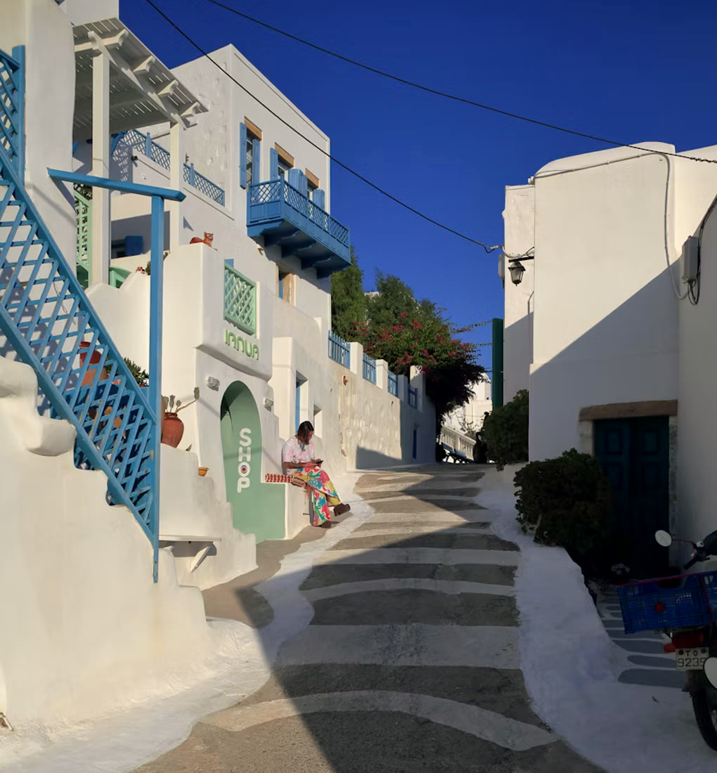 Whitewashed alley with steps in Astypalaia